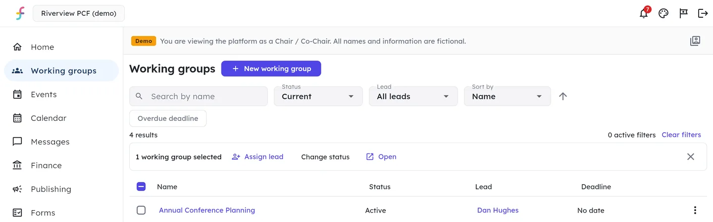 The Working groups list has a New working group button, a search box, Status, Lead and Sort by menus and an Overdue deadline filter above a table of four groups giving each one's name, status, lead and deadline. School Transport is ticked, and a bar above the table reads 1 working group selected, with Assign lead, Change status and Open.